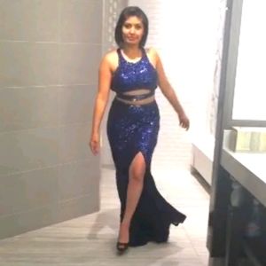 Blue sequined dress.